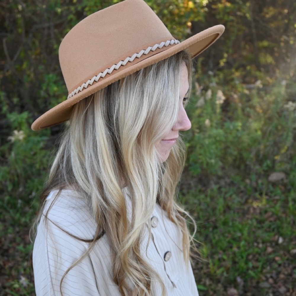 Brown soft hat.